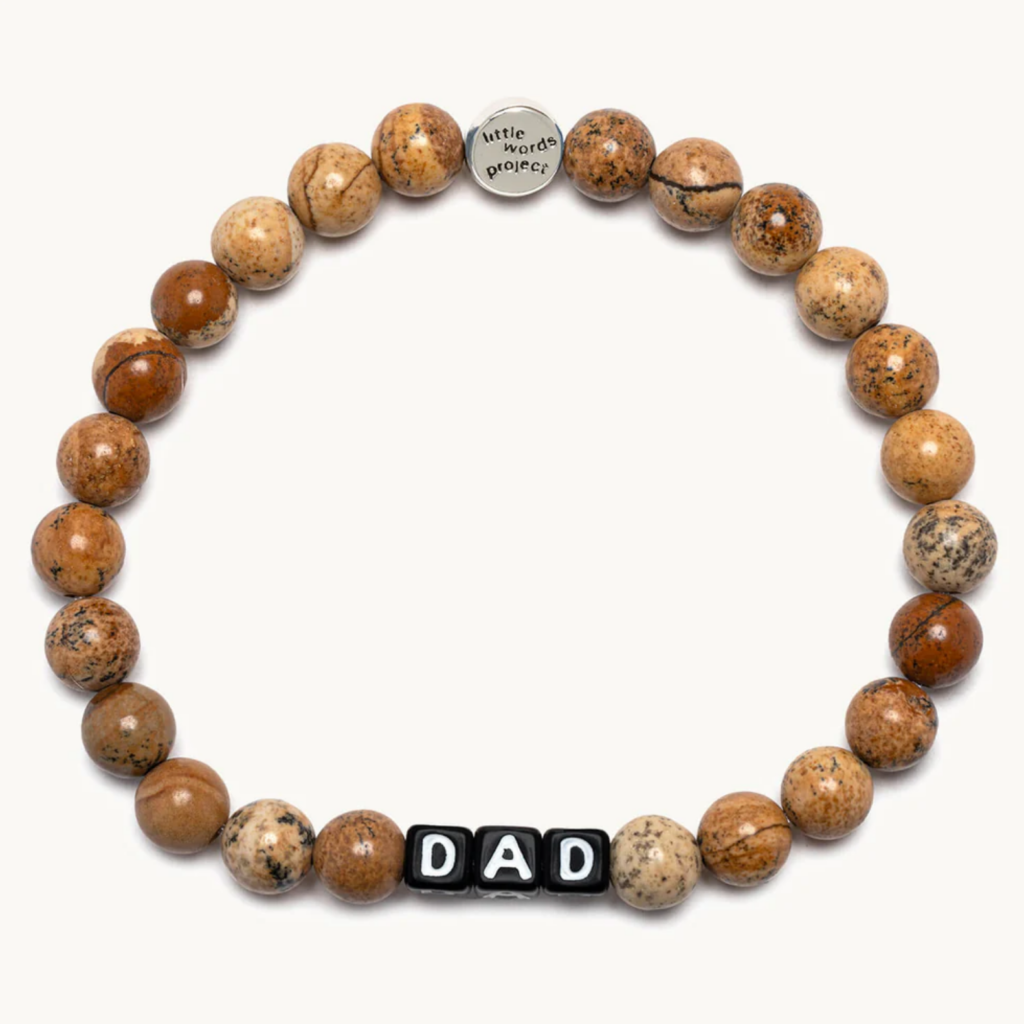 A beaded bracelet that says "Dad"