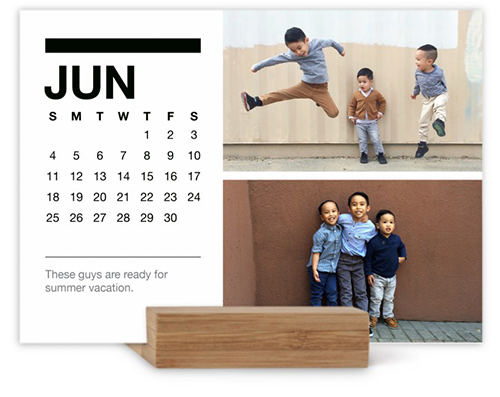 A calendar with pictures of kids.