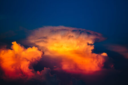 vibrant cumulonimbus cloud at sunset
